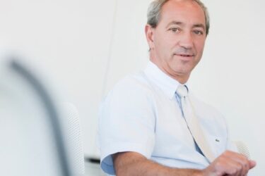 Robert Roux ceo System Solutions